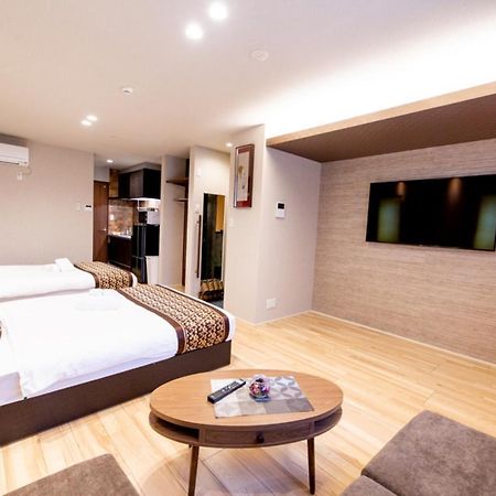 Grand Base Hiroshima Hikarimachi Aparthotel Bagian luar foto