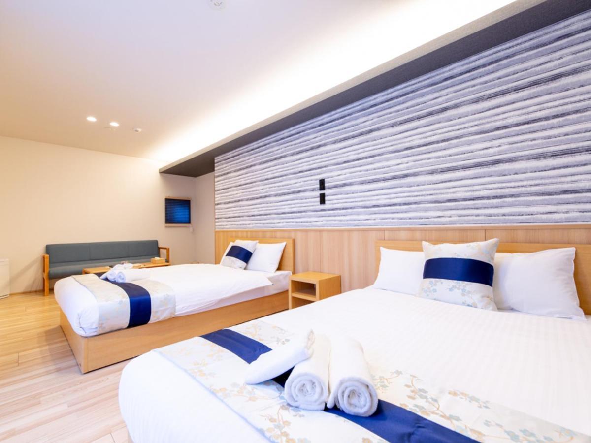 Grand Base Hiroshima Hikarimachi Aparthotel Bagian luar foto