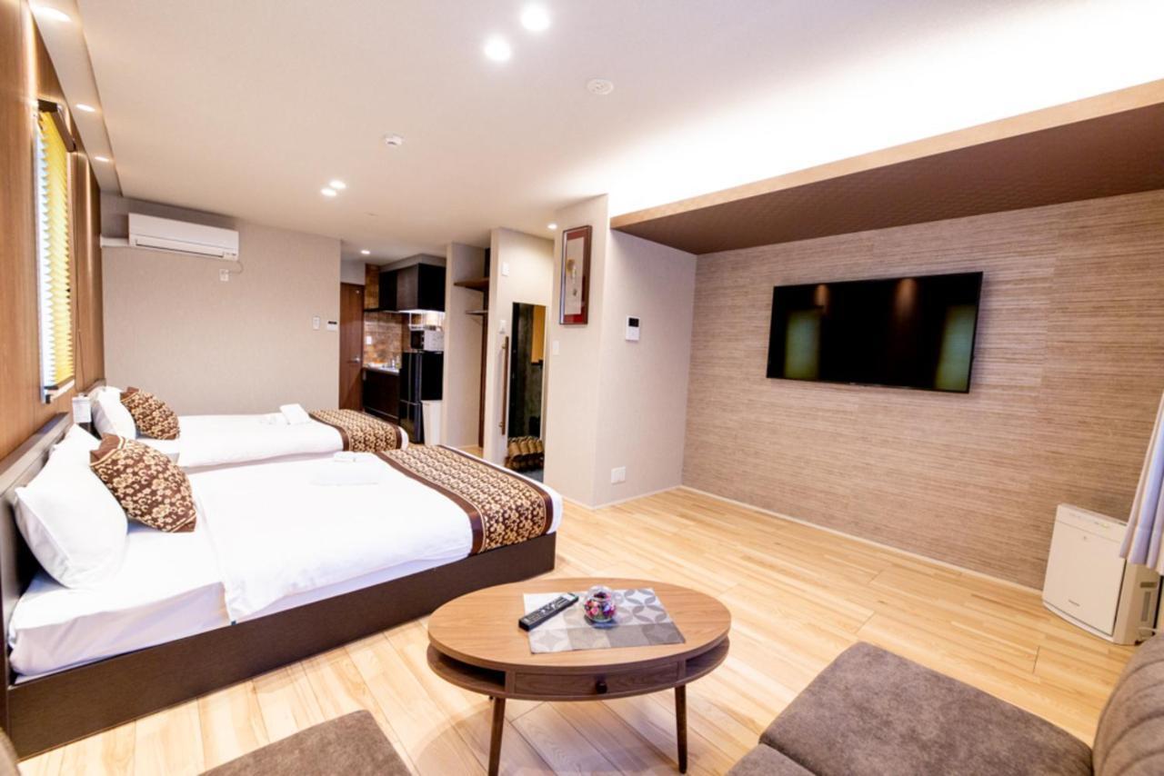 Grand Base Hiroshima Hikarimachi Aparthotel Bagian luar foto