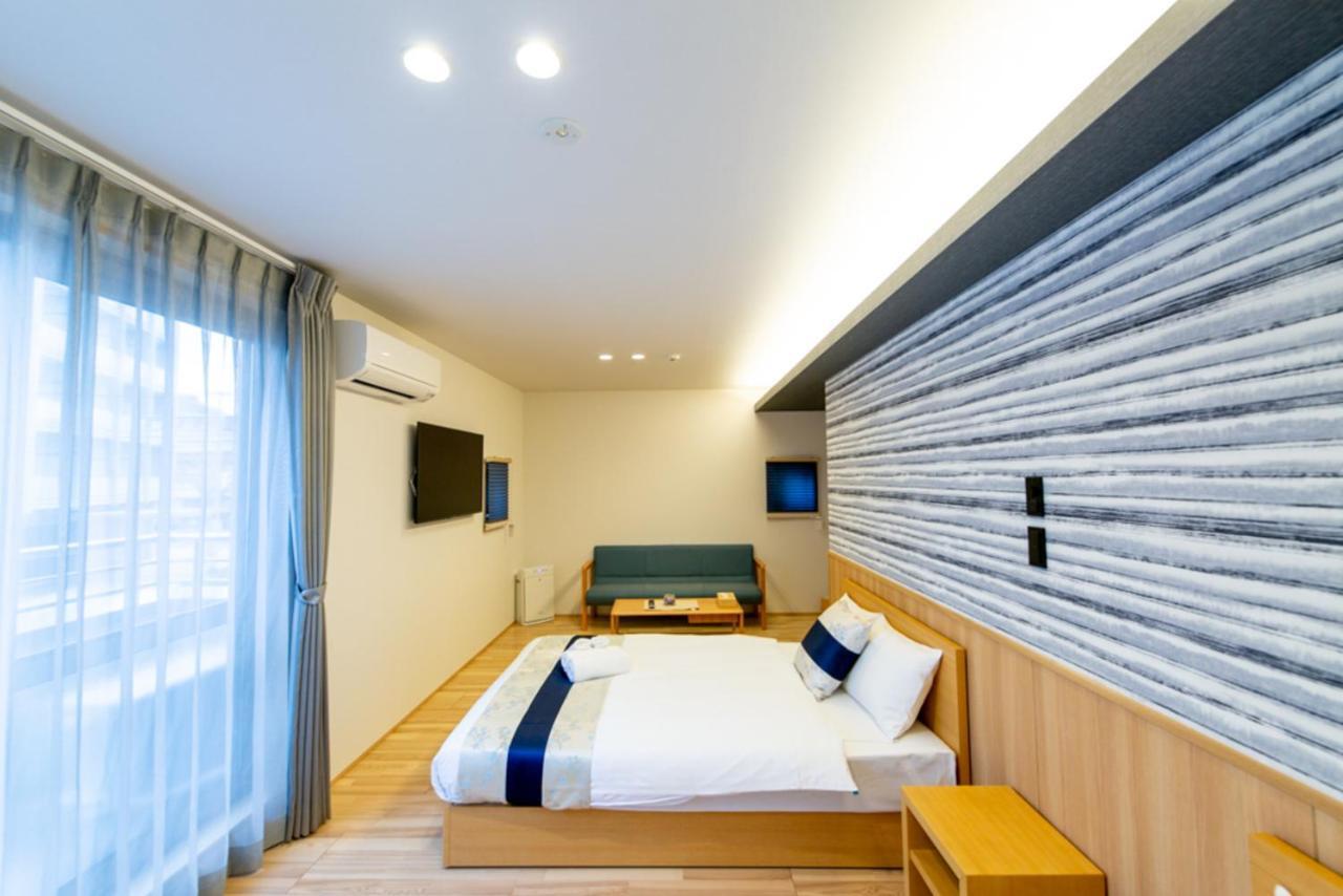 Grand Base Hiroshima Hikarimachi Aparthotel Bagian luar foto
