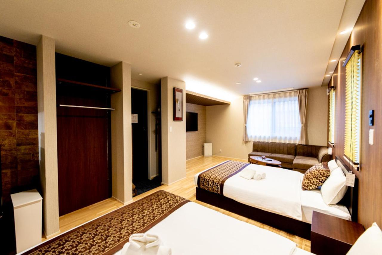 Grand Base Hiroshima Hikarimachi Aparthotel Bagian luar foto