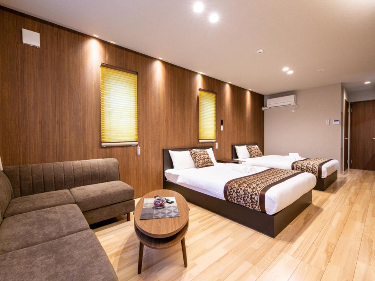 Grand Base Hiroshima Hikarimachi Aparthotel Bagian luar foto