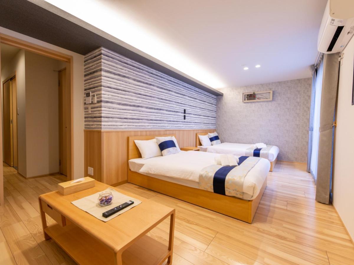 Grand Base Hiroshima Hikarimachi Aparthotel Bagian luar foto