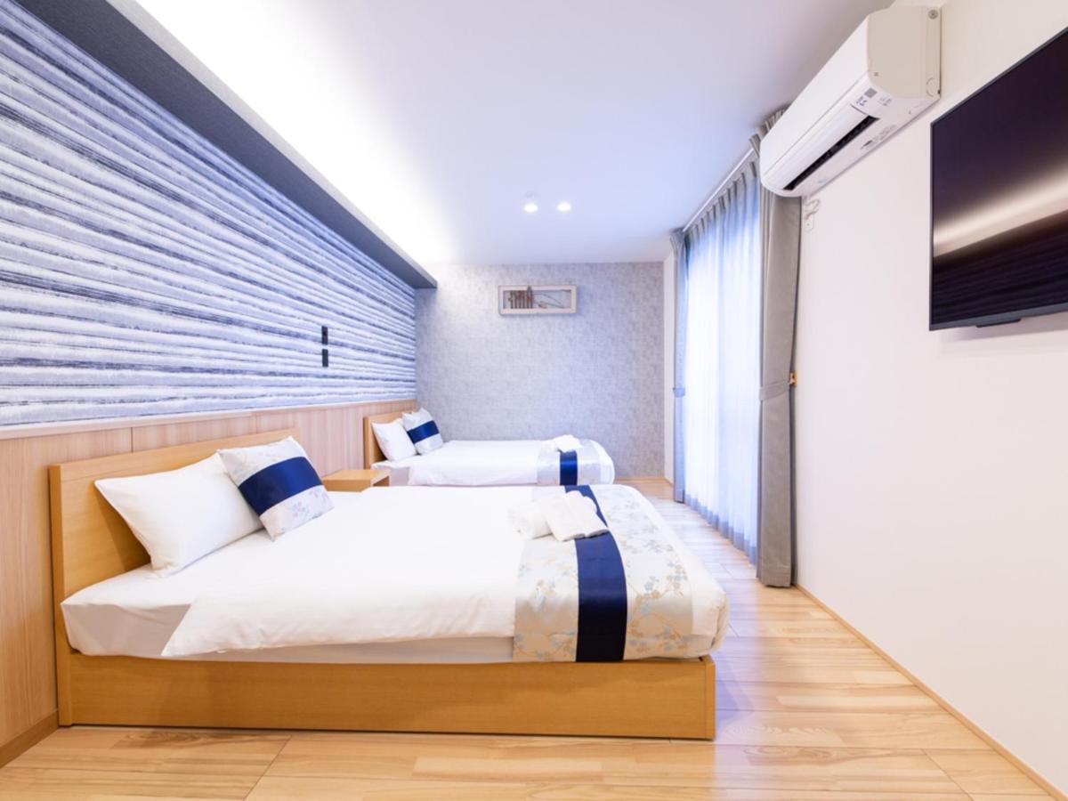 Grand Base Hiroshima Hikarimachi Aparthotel Bagian luar foto