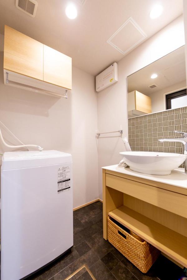 Grand Base Hiroshima Hikarimachi Aparthotel Bagian luar foto