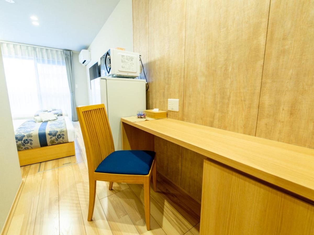 Grand Base Hiroshima Hikarimachi Aparthotel Bagian luar foto