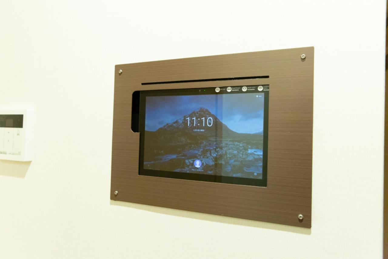 Grand Base Hiroshima Hikarimachi Aparthotel Bagian luar foto