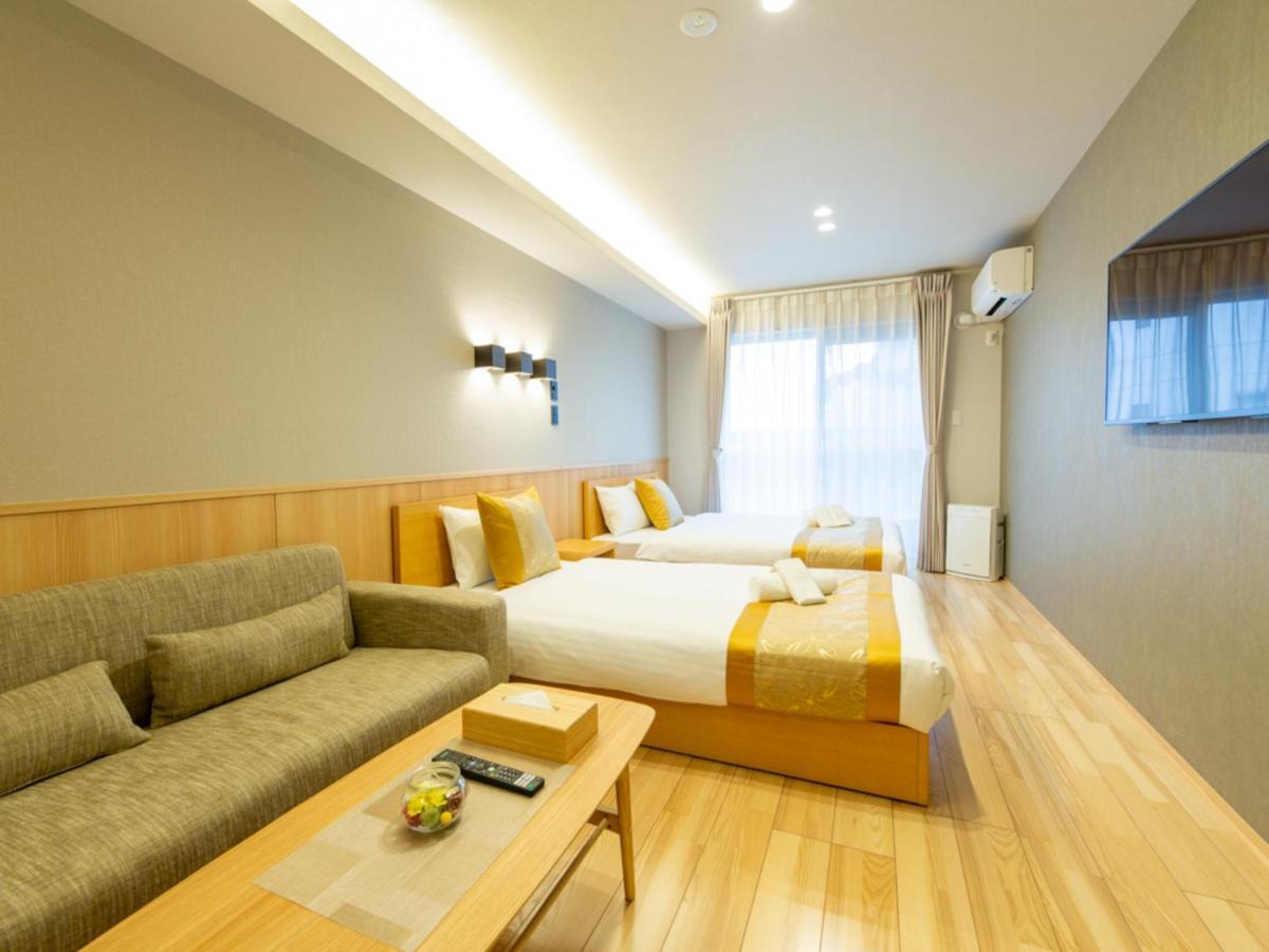 Grand Base Hiroshima Hikarimachi Aparthotel Bagian luar foto