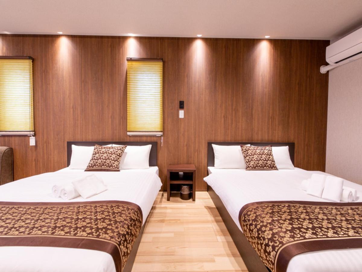 Grand Base Hiroshima Hikarimachi Aparthotel Bagian luar foto