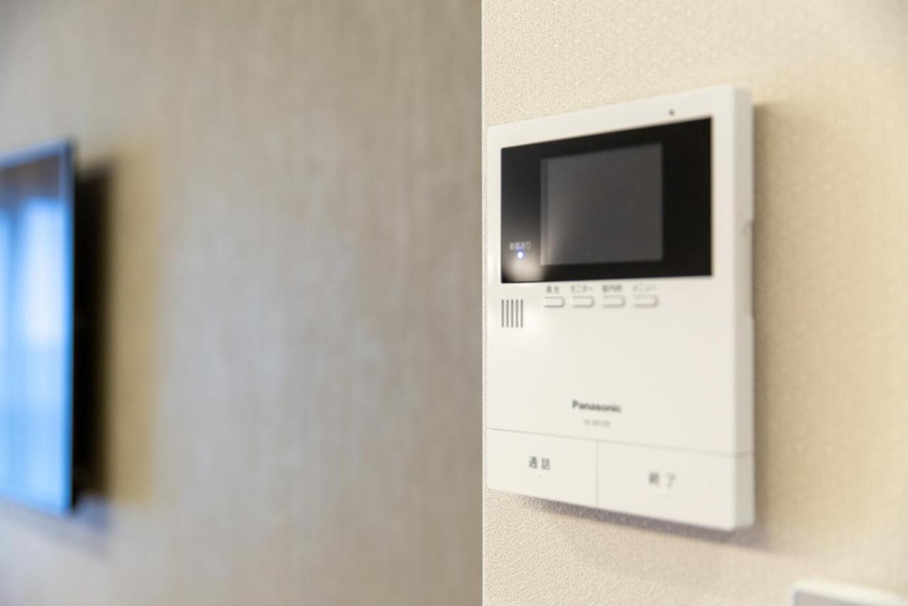 Grand Base Hiroshima Hikarimachi Aparthotel Bagian luar foto