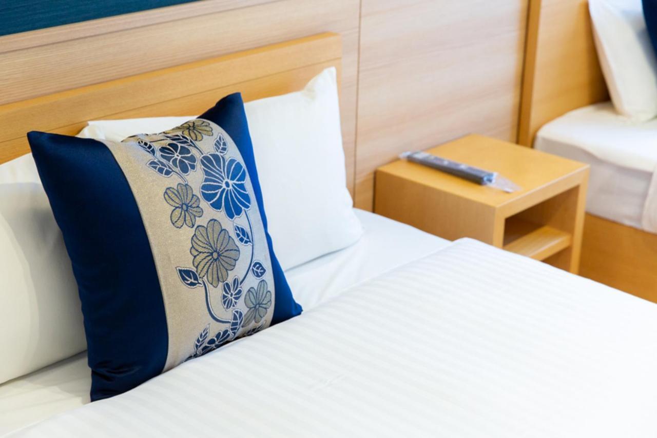 Grand Base Hiroshima Hikarimachi Aparthotel Bagian luar foto