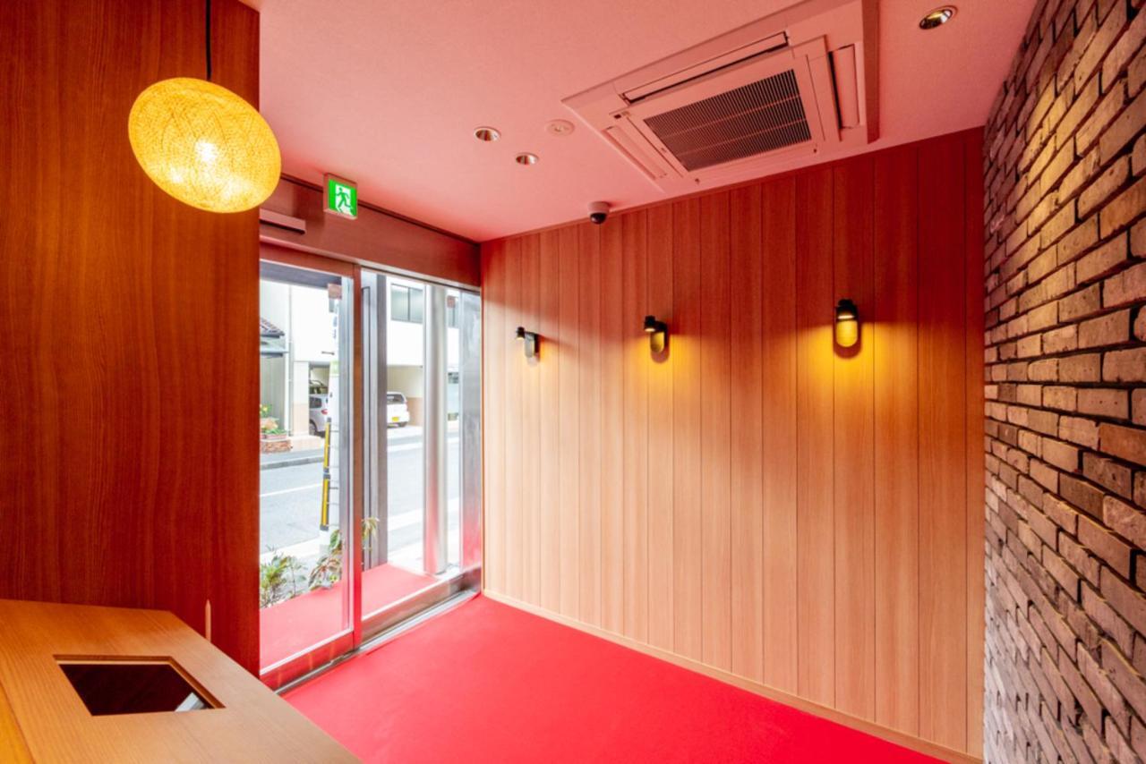 Grand Base Hiroshima Hikarimachi Aparthotel Bagian luar foto