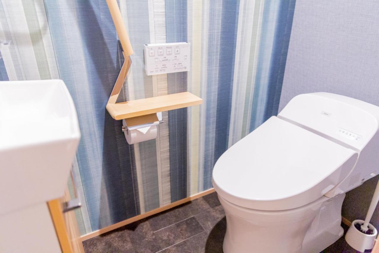 Grand Base Hiroshima Hikarimachi Aparthotel Bagian luar foto
