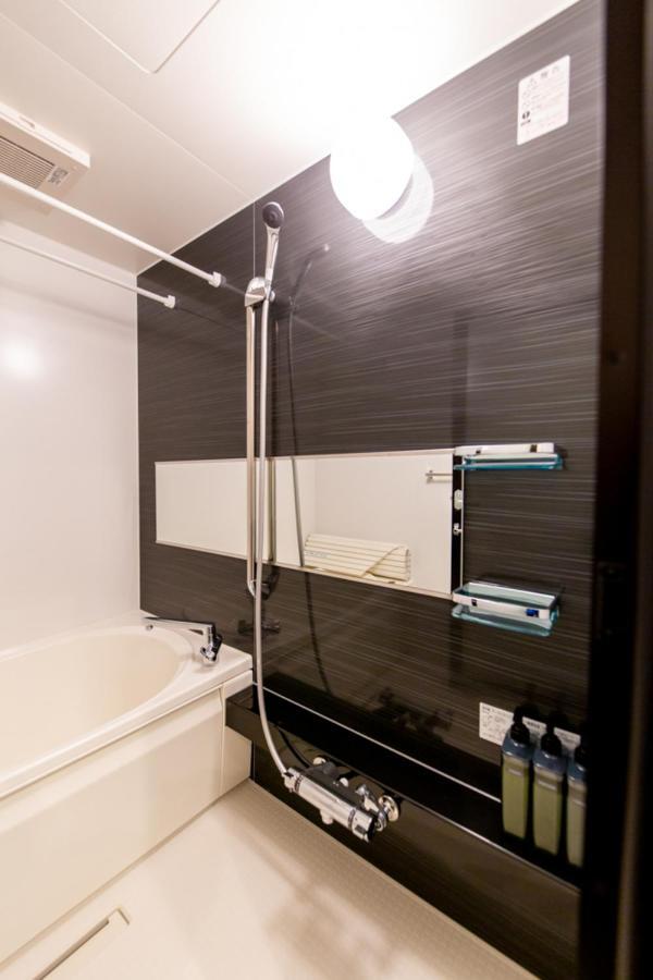 Grand Base Hiroshima Hikarimachi Aparthotel Bagian luar foto