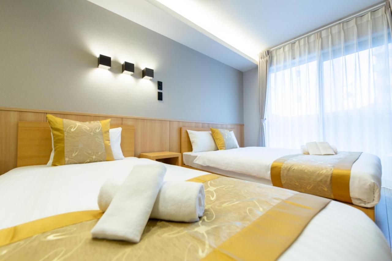 Grand Base Hiroshima Hikarimachi Aparthotel Bagian luar foto