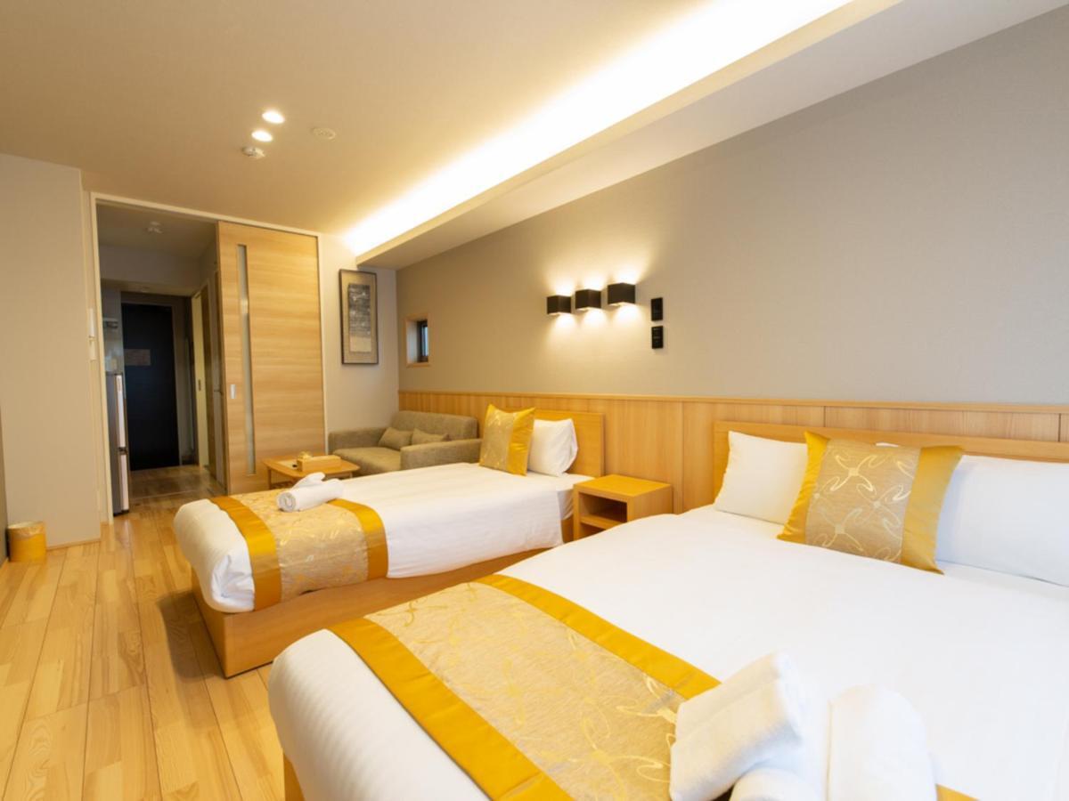 Grand Base Hiroshima Hikarimachi Aparthotel Bagian luar foto