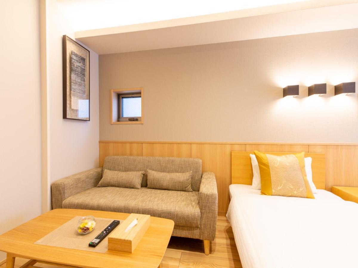 Grand Base Hiroshima Hikarimachi Aparthotel Bagian luar foto