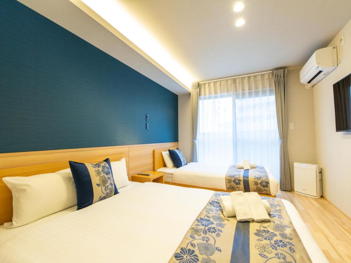 Grand Base Hiroshima Hikarimachi Aparthotel Bagian luar foto