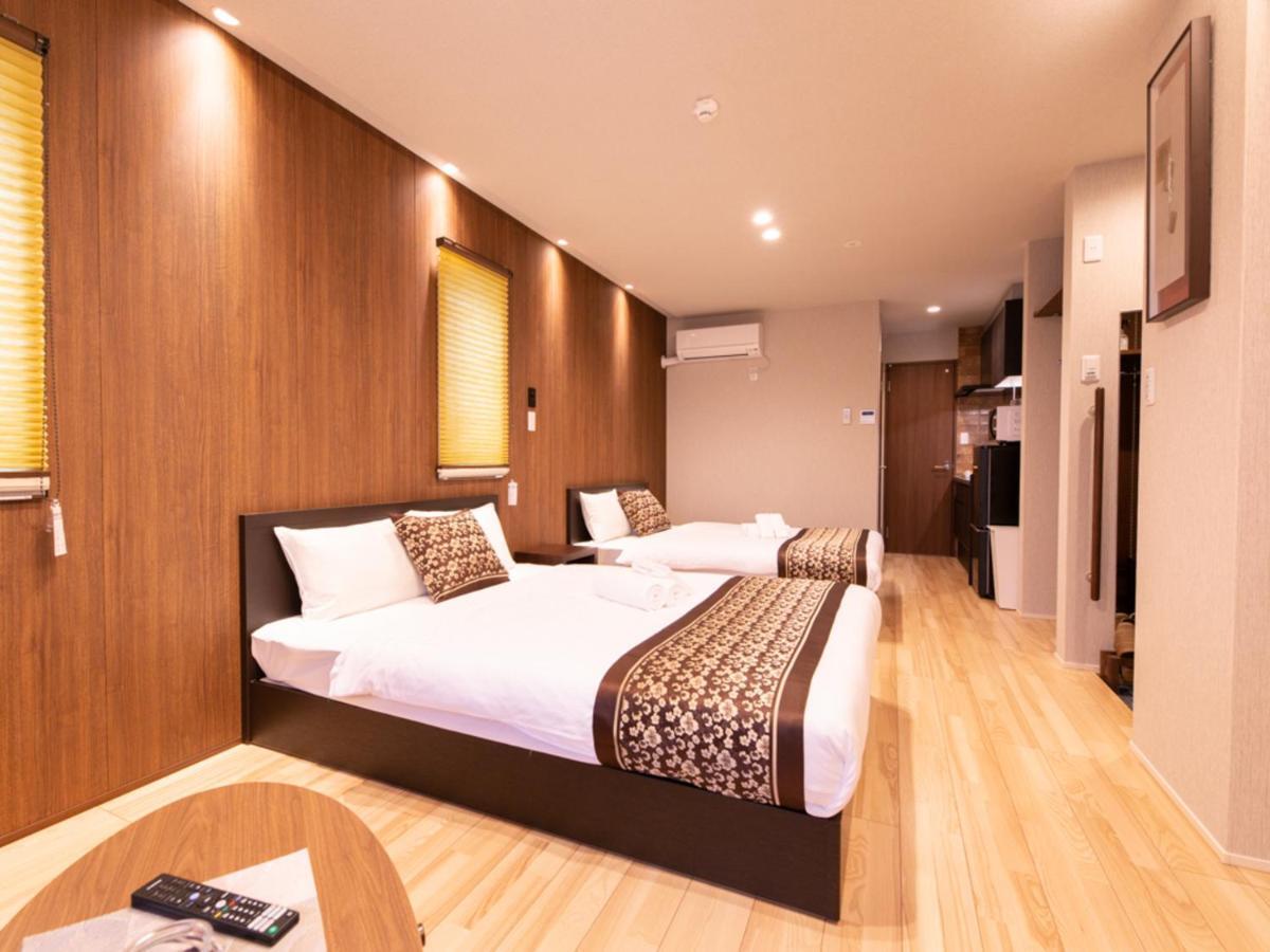 Grand Base Hiroshima Hikarimachi Aparthotel Bagian luar foto
